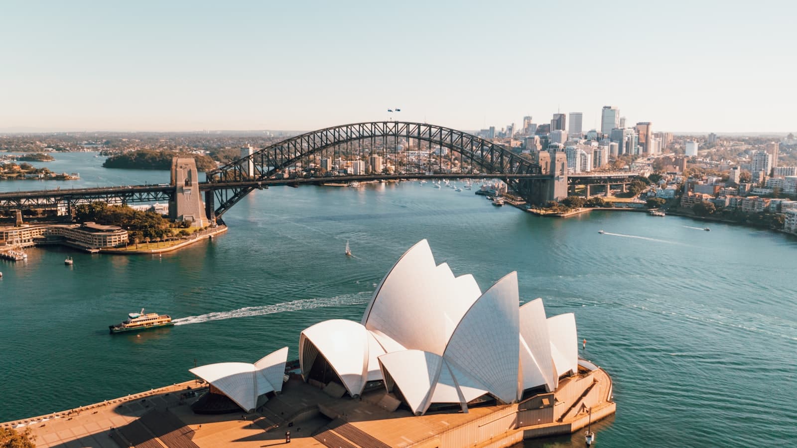 Aerial view of the Sydney Opera House with the Harbour Bridge across the water