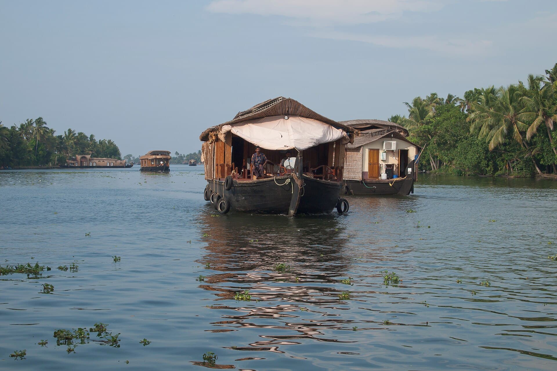 A rice-barge houseboat on Kerala's palm-lined backwaters