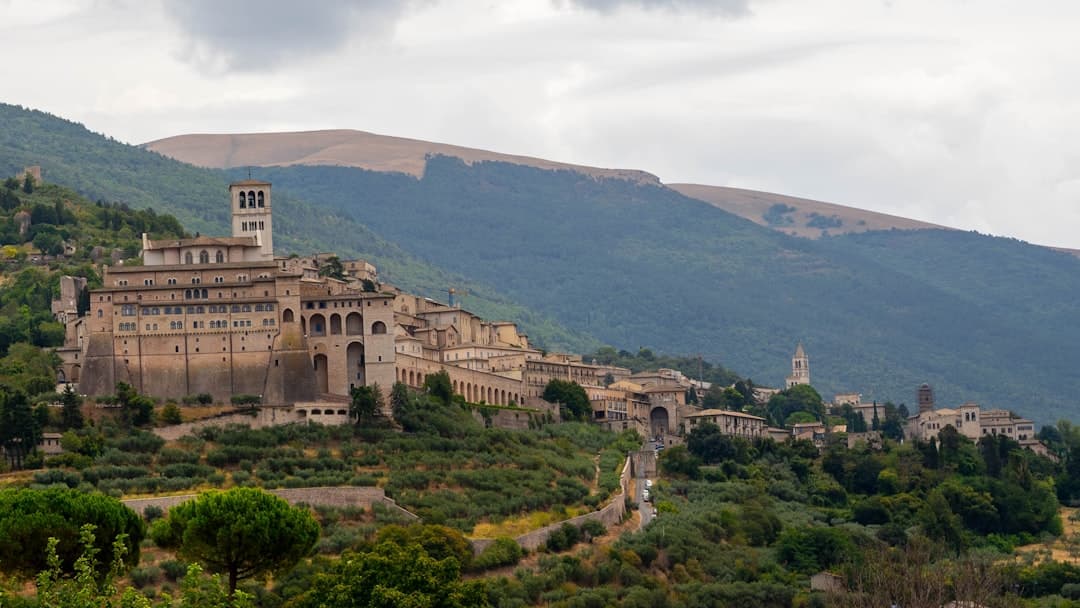Assisi's basilica riding its Umbrian hillside