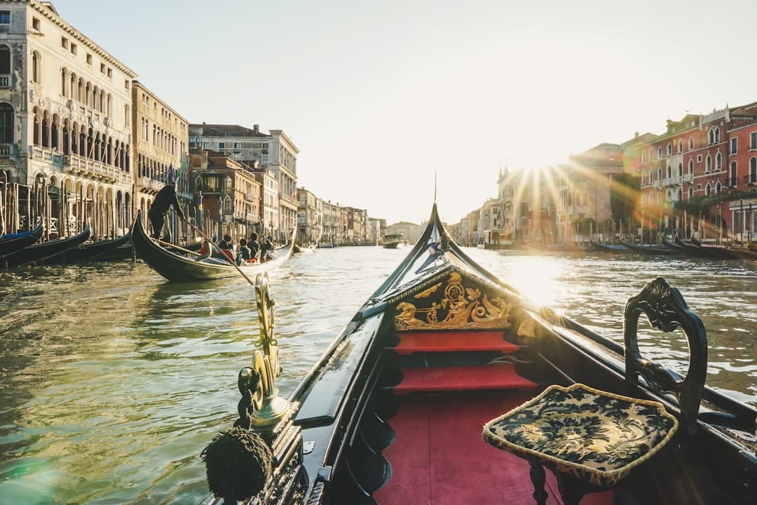 A gondola slipping down a quiet Venetian canal