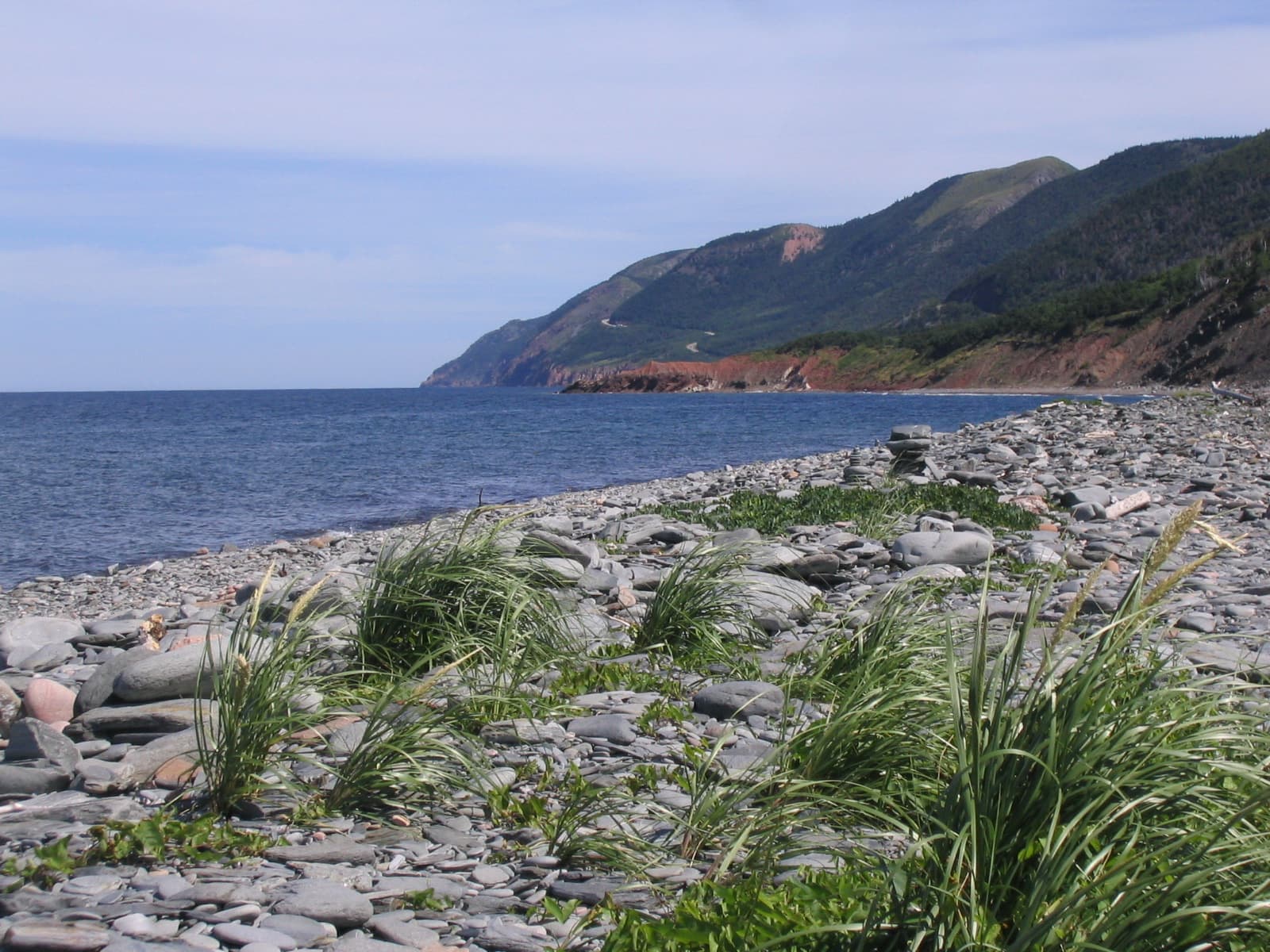 The Cabot Trail's shoreline curving below Cape Breton's highlands