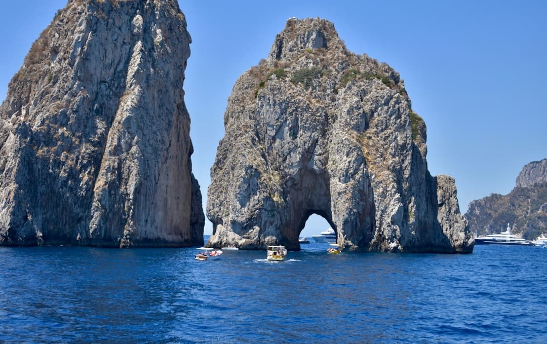 Capri's faraglioni rising from a deep blue sea